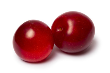 Red plum fruit isolated on white background