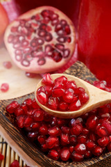 Pomegranate juice with red background