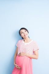 Fototapeta premium pregnant woman look somewhere