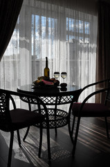 Dinner on the terrace with wine and fruits