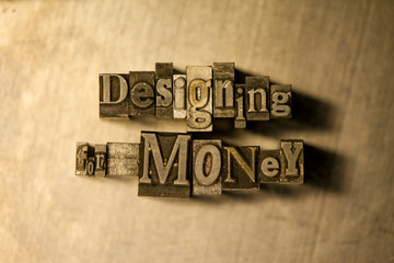 Fototapeta premium Designing for money - letterpress text sign