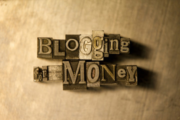 Obraz premium Blogging for money - letterpress text sign