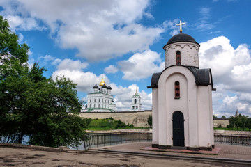 View of the Pskov Kremlin and Saint Olga's chapel from Velikaya River in the summer in a sunny weather