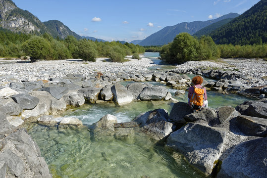 Germany, Bavaria, Sylvenstein, Teenage hiker taking a break
