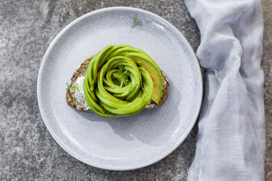 Avocado rose on bread