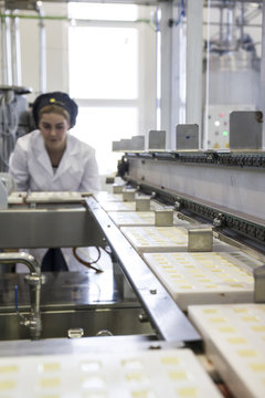 Woman working in a chocolate factory