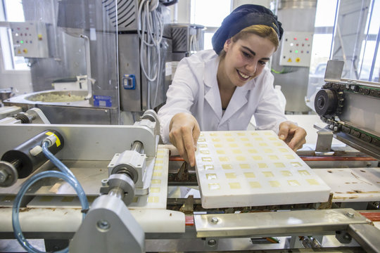 Woman working in a chocolate factory