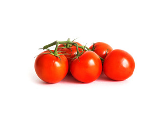 Vine tomatoes isolated on white