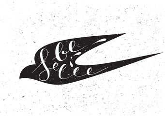 Stylized silhouette swallow with motivation quote Be free.