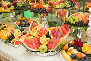 Authentic buffet, assorted fresh fruits, berries and citrus. Preparation for design creative menu