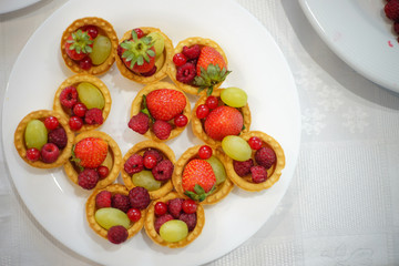 Bowl with berries on the table