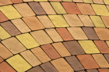 Colorful square radial paving slabs close up