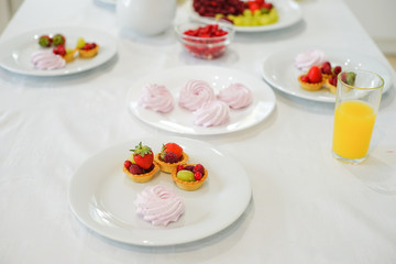 Bowl with berries on the table