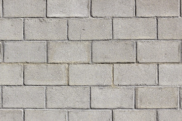 Fototapeta premium Background image of a wall made with concrete blocks.