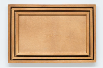 Fototapeta premium Three wooden tray on white background and selective focus