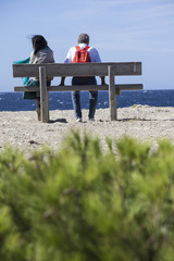 couple sitting on bench