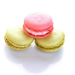 Sweet and colourful french macaroons or macaron on white background