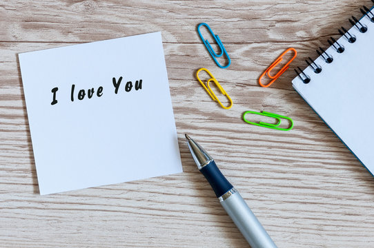 I LOVE YOU hand writting lettering on note at workplace or table