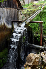 Old functional working mill wheel © salajean
