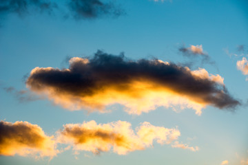 Fototapeta na wymiar Puffy and colorful sunset clouds
