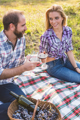 Couple drinking wine in the garden