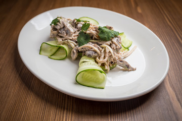 salad appetizer with chicken liver, arugula