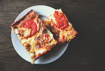 Rustic pizza with tomatoes
