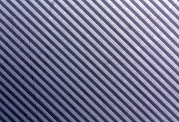 Obraz premium Blue metal plate surface with scratches.