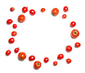 Cherry tomatoes isolated on white top view in shape of circle. Round vegetable frame.