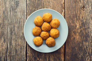 Arancini sicilian street food - rice balls stuffed with meat cooked