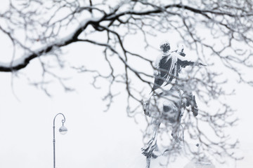 Bronze Horseman through the snow-covered branch. Winter view of the Monument of Peter Great by architect Falconet in 1770, St. Petersburg, Russia