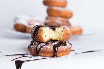 homemade donuts with chocolate on the table