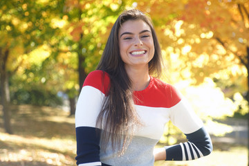 Young woman in autumn setting