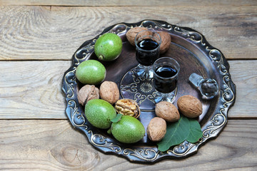 Liqueur from young green walnuts
