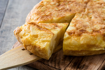 Traditional spanish omelette on wooden table

