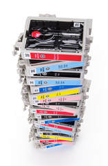 Looking down on stacked empty ink cartridges, contains clipping