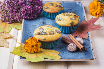 pumpkin muffins on the wooden table