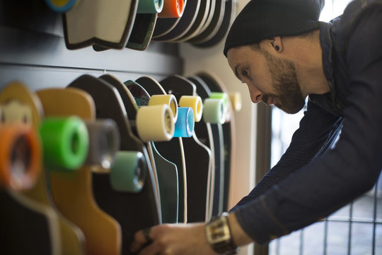 Man shopping for skate boards