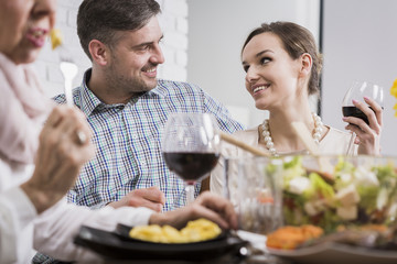 Couple smiling at a table