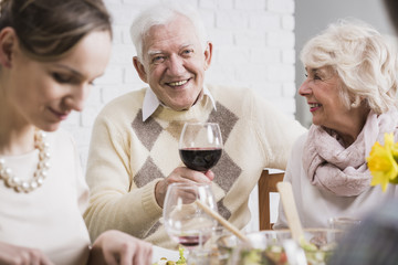 Man holding a glass of wine