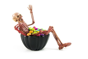 skeleton in black bucket candy