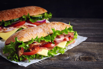 Fototapeta Two fresh submarine sandwiches obraz