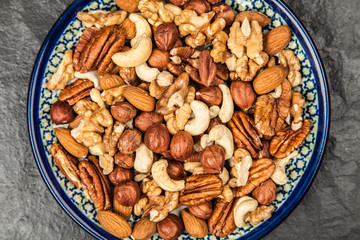 Mix of different nuts closeup photo