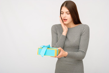 Young woman portrait holding gift