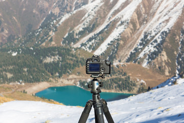 the camera photographs the mountain