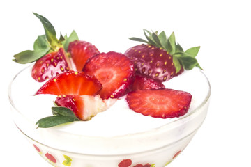sliced strawberries in strawberry yogurt