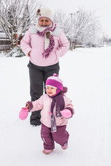 Grandmother with granddaughter for a walk