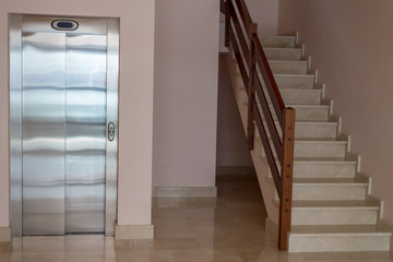 view of the staircase with elevator in apartment house