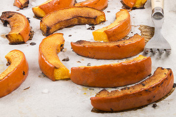 grilled hokkaido pumpkin slices on white kitchen paper