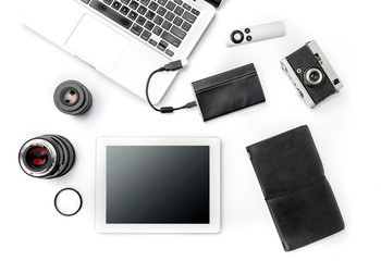 Workplace of business. Modern male accessories and laptop on white